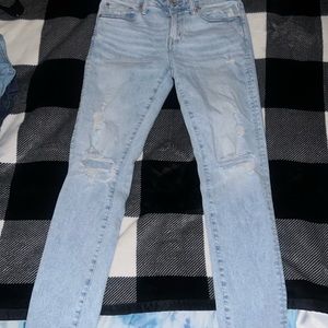 Skinny ripped blue jeans